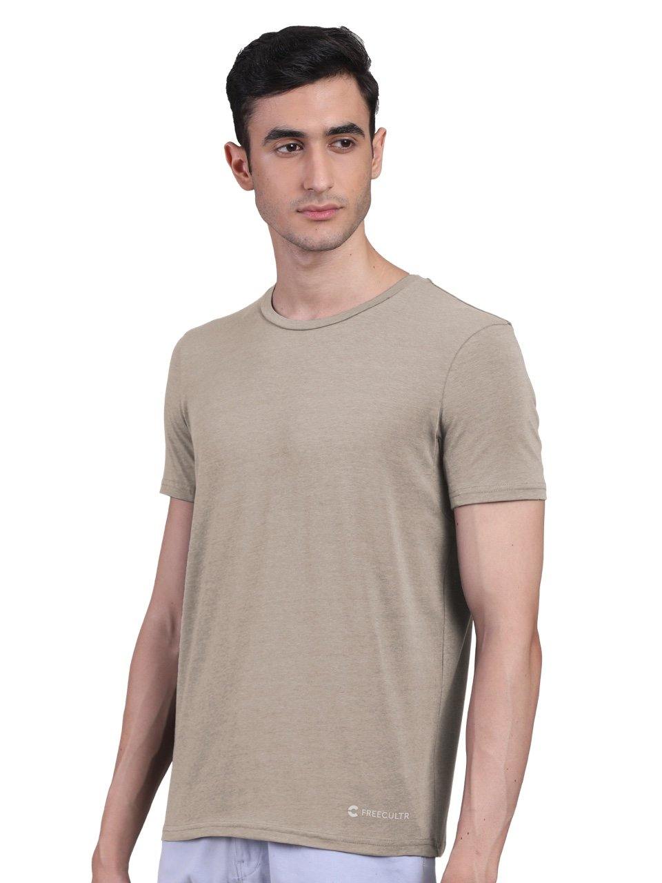 Freecultr undershirt for men shown in multiple colors demonstrating visibility under different formal shirt fabrics