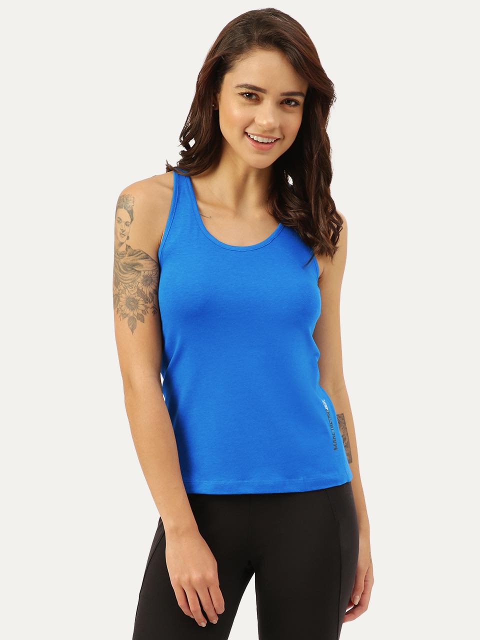 Freecultr tank tops for women in micro-modal fabric, styled for gym and everyday wear in neutral and bold colours