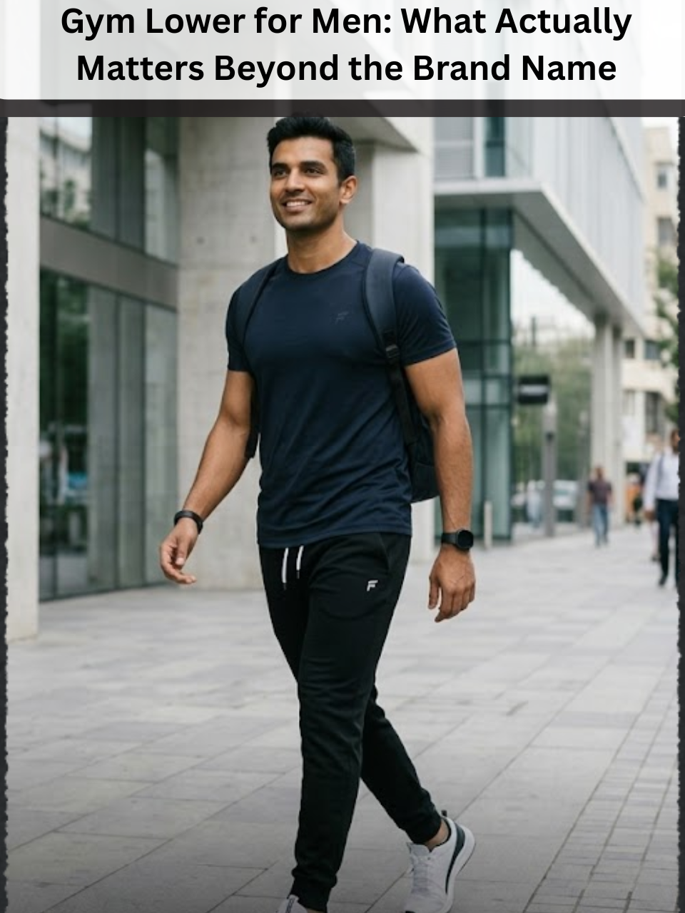  Freecultr gym lower for men in breathable stretch fabric showing relaxed jogger fit and elastic waistband detail in dark colour on clean background