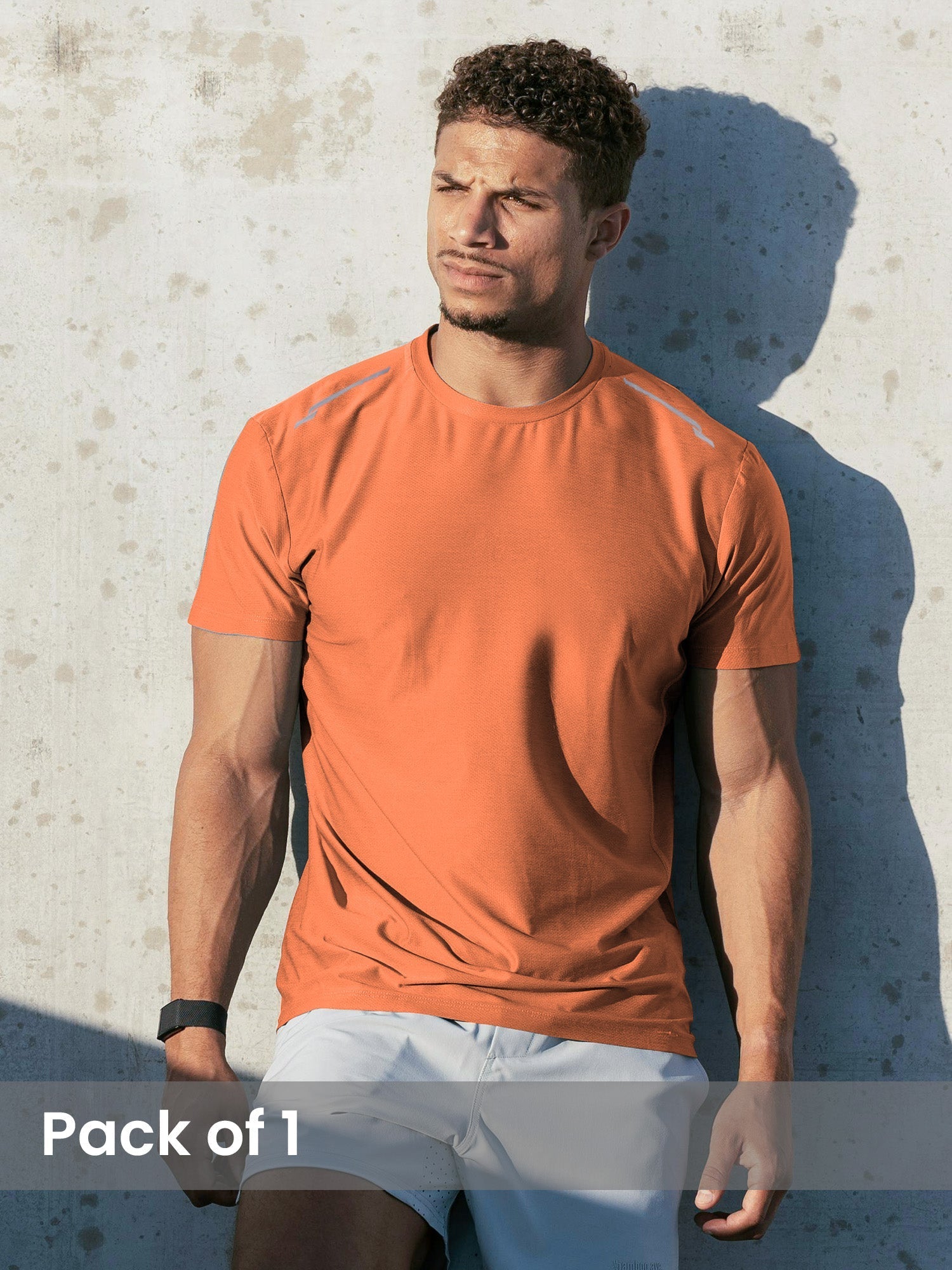 An athlete demonstrating the enhanced mobility and comfortable fit of a sports t-shirt during a dynamic workout.