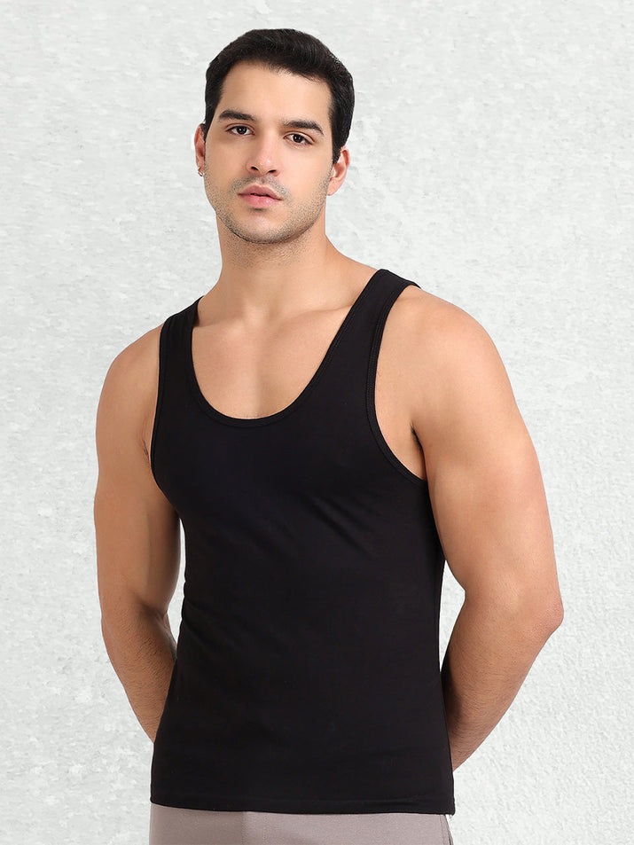 A man dressed in performance-optimized gym clothes for a productive workout.